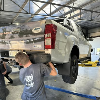 Fitting a towbar to a Nissan Navara on the workshop lift