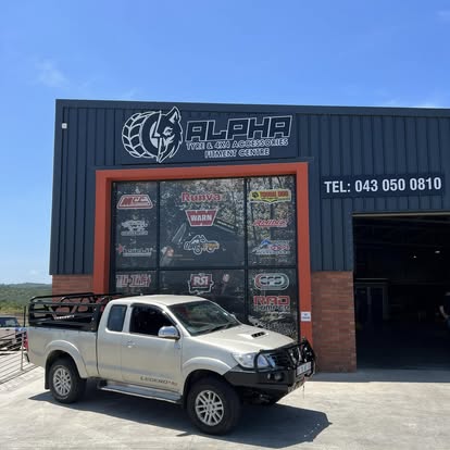 Toyota Hilux Legend 45 with bull bar and load-bin rack