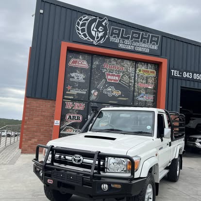 Land Cruiser 79 with ARB bull bar and rack at the Alpha shopfront