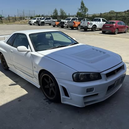 Nissan Skyline R34 on the forecourt at Alpha